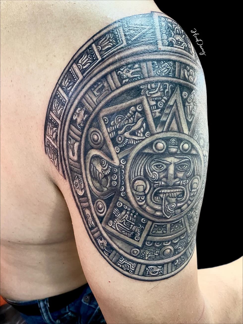 Detailed black and grey Mesoamerican tattoo by HoaDang